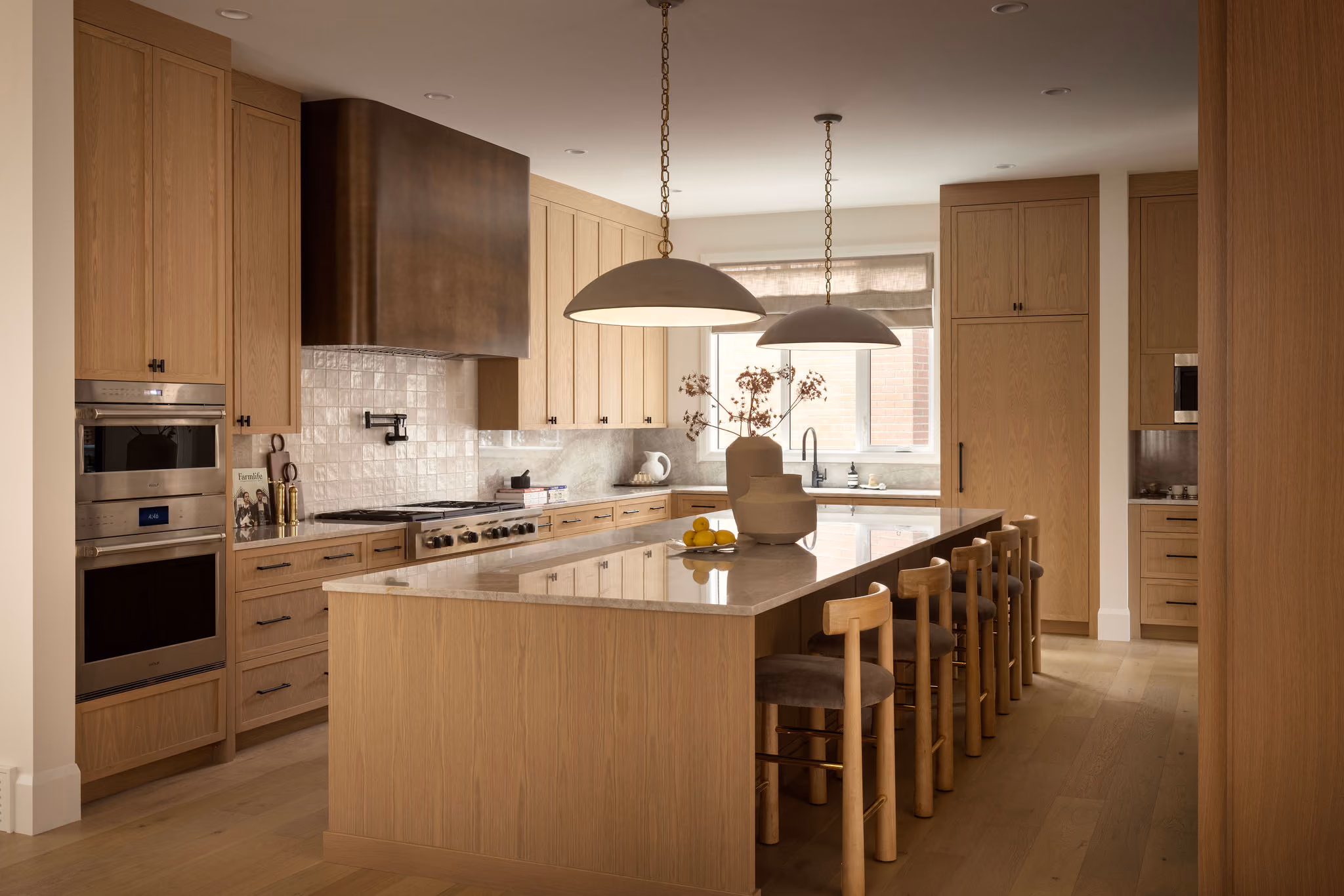 Kitchen with oak cabinets and large island